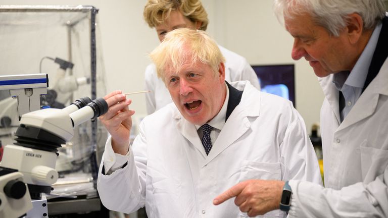 British Prime Minister Boris Johnson visits the laboratory, next to Director Paul Nurse, at Francis Crick Institute in London, Britain July 11, 2022. Leon Neal/Pool via REUTERS