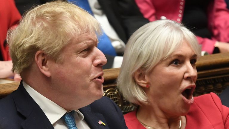 British Prime Minister Boris Johnson and Culture Secretary Nadine Dorries react during a Prime Minister&#39;s Questions session at the House of Commons, in London, Britain, March 9, 2022. UK Parliament/Jessica Taylor/Handout via REUTERS THIS IMAGE HAS BEEN SUPPLIED BY A THIRD PARTY. MANDATORY CREDIT. IMAGE MUST NOT BE ALTERED.