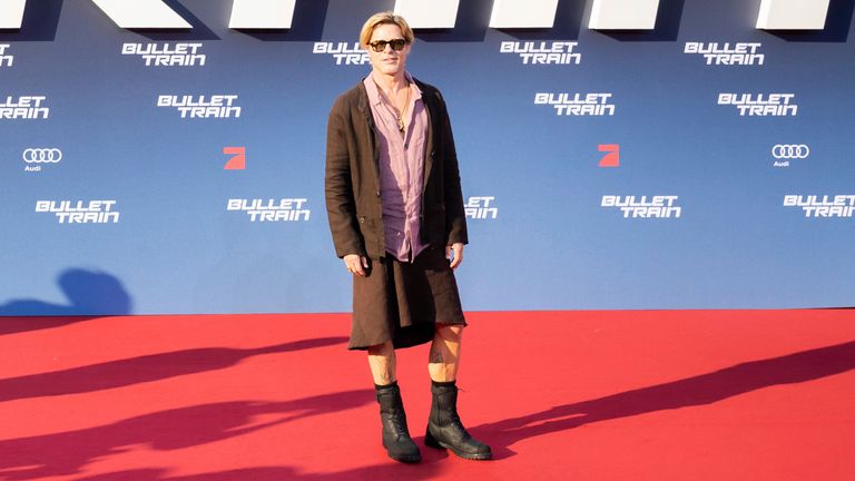 Brad Pitt beats the heat by rocking a skirt to premiere of new movie