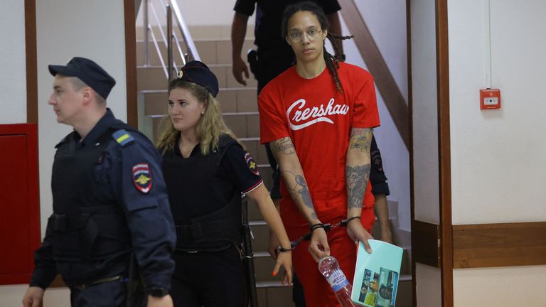 U.S. basketball player Brittney Griner, who was detained in March at Moscow&#39;s Sheremetyevo airport and later charged with illegal possession of cannabis, is escorted before a court hearing in Khimki outside Moscow, Russia July 7, 2022. REUTERS/Evgenia Novozhenina
