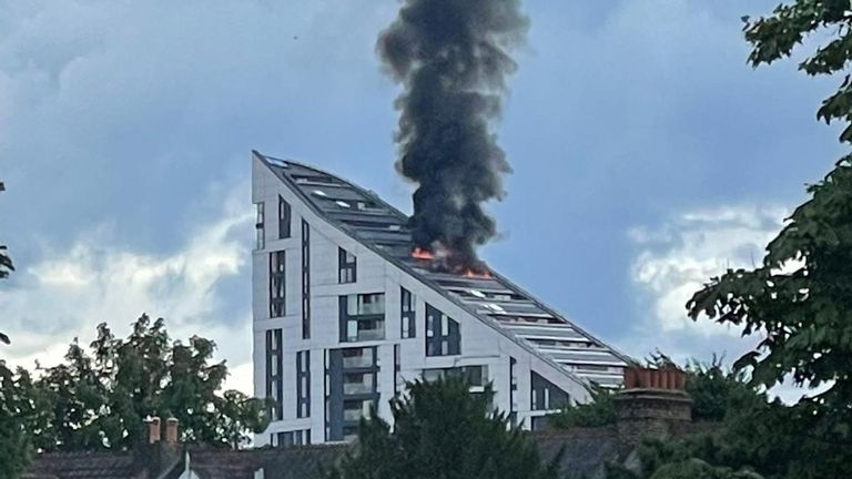 Around 100 firefighters battle blaze on 15th floor of London tower block | UK News