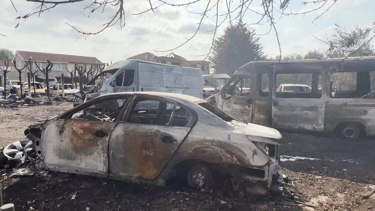 Cars and vans were destroyed by fires as the country baked in record temperatures 