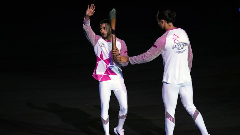 Galal Yafai (left) with the Queen&#39;s Baton during the opening ceremony of the Birmingham 2022 Commonwealth Games at the Alexander Stadium, Birmingham. Picture date: Thursday July 28, 2022.