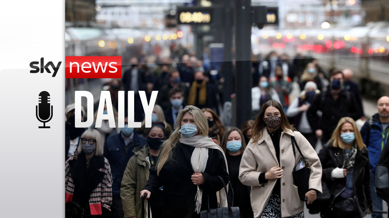 People walk along a platform at Kings Cross train station during morning rush hour, amid the coronavirus disease (COVID-19) outbreak in London, Britain, December 1, 2021.