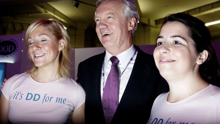 Shadow Home secretary David Davies poses with some of his supporters wearing &#39;It&#39;s DD for me&#39; t-shirts on the opening day of the Conservative party conference in Blackpool. Monday 3rd October 2005 See PA Story TORY Contender..PRESS ASSOCIATION Photo. Photo credit should read: Phil Noble/PA