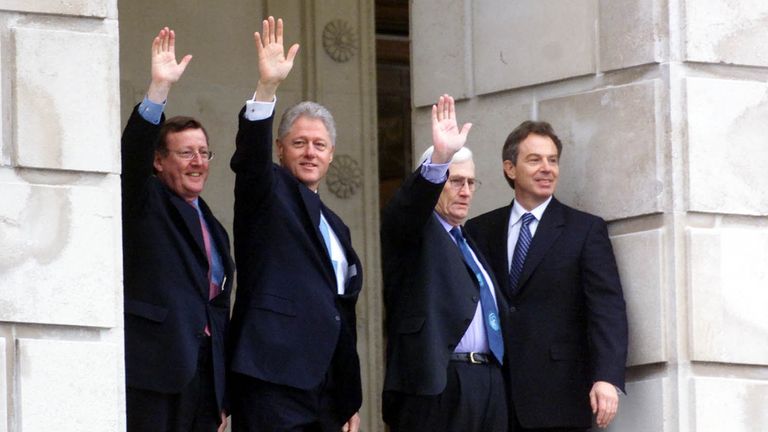 US President Bill Clinton (second left) and Britain's Prime Minister Tony Blair (right) with Northern Ireland's First Minister David Trimble (left) and Deputy First Minister Seamus Mallon on the steps of the Parliament Buildings, Stormont, Belfast.  