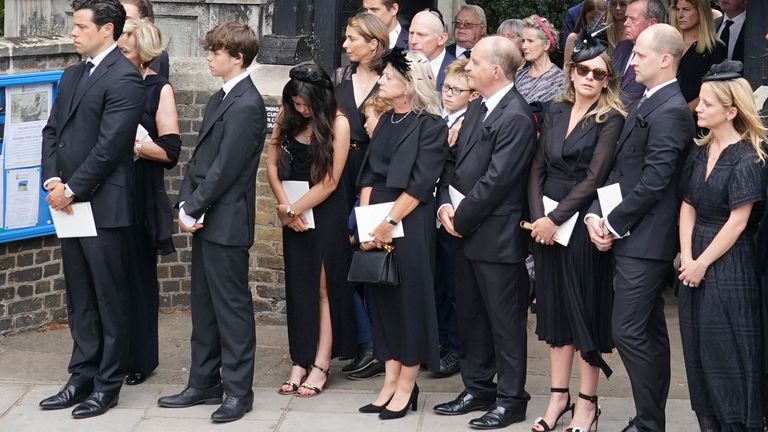 Dame Deborah James' family, which includes husband Sebastien Bowen (far left), son Hugo Bowen (second from left) and daughter Eloise Bowen (third from left), leave her funeral service at St Mary's Church in Barnes, West London.  Photo date: Wednesday, July 20, 2022.