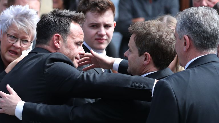 Ant and Dec embrace outside the cathedral