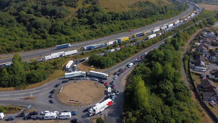 Traffic queues on the M20 near Folkestone in Kent as delays at the Port of Dover and Eurotunnel continue to effect journeys as many families embark on getaways following the start of summer holidays for schools in England and Wales. Picture date: Saturday July 23, 2022.