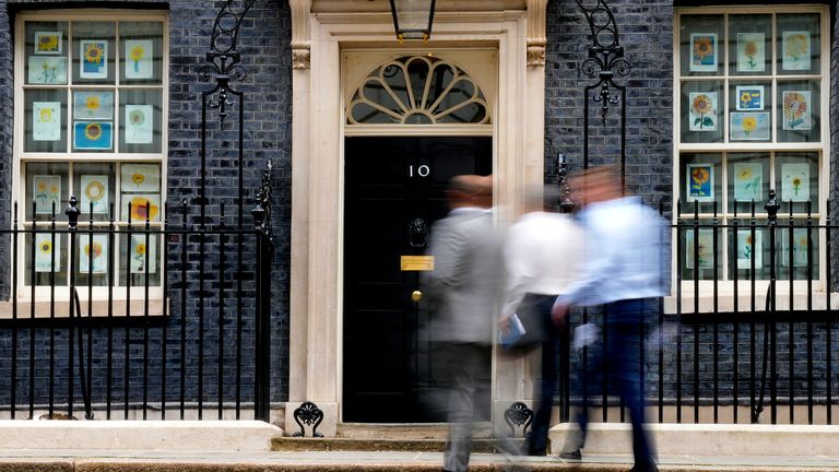 People arrive at 10 Downing Street in London, Monday, May 23, 2022. The general public is awaiting the release of Sue Gray&#39;s report into COVID lockdown breaches across Whitehall, the so called "Partygate". (AP Photo/Frank Augstein)
PIC:AP

