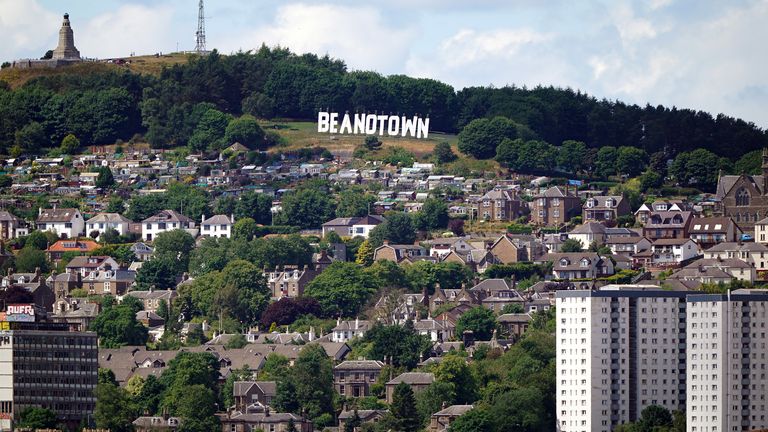 The giant sign erected at Dundee Law renaming the city of Dundee to Beanotown to mark the start of the Dundee Bash Street Festival, which celebrates the city&#39;s comic book heritage. Designers have taken their inspiration from the famous Hollywood sign, the sign is six-metres high by 38-metres long and will be seen from around the city and across the Tay for the duration of the festival. Picture date: Friday July 15, 2022.