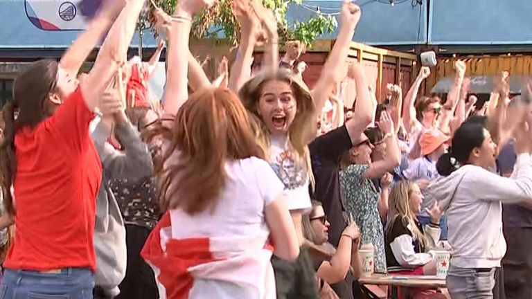 England fans celebrate two goals and ultimately their victory in Trafalgar Square, Manchester.  The Lions won 2-1 against Germany in the Euro 2022 Women's final.