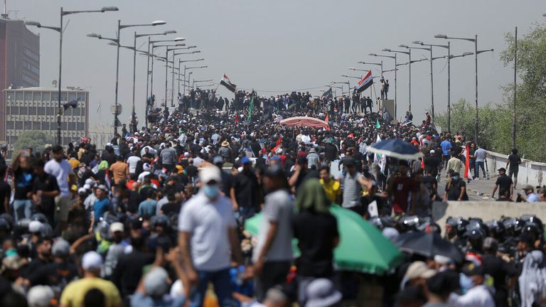 Protestors gather on a bridge leading to the Green Zone area in Iraqi capital, Baghdad on Saturday, 30 June Pic: AP 