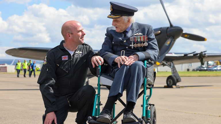 Squadron Leader Mark Sugden (Storm Pilot) speaks to Group Captain Johnny 'Paddy' Hemingway shortly after landing