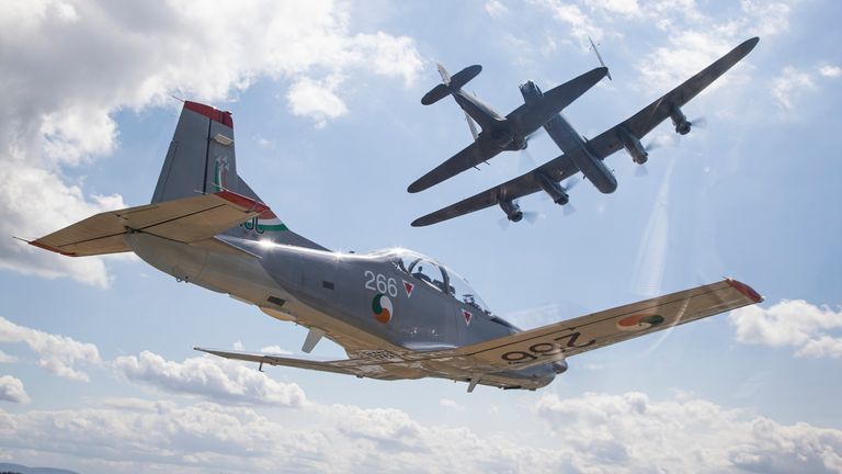 Battle of Britain Memorial Flight being escorted over by the &#39;The Silver Swallows&#39;