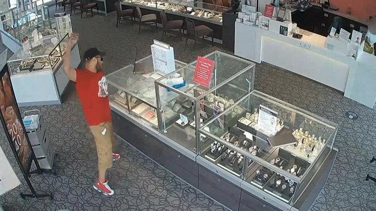 Suspect makes repeated attempts to smash a jewel cabinet with a brick