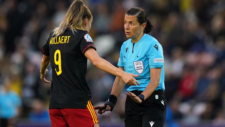 Referee Kateryna Monzul speaks with Belgium’s Tessa Wullaert during the UEFA Women's Euro 2022 quarter-final match at Leigh Sports Village. Picture date: Friday July 22, 2022.    