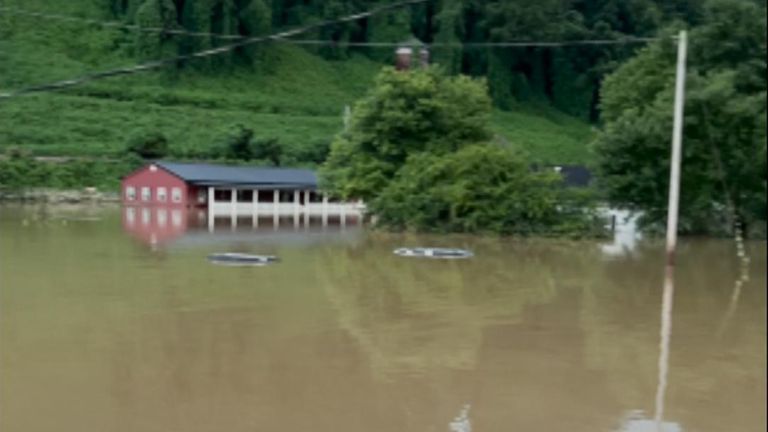Cars submerged after deadly flash floods