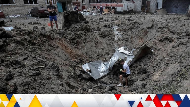 A large crater is visible in a college yard from overnight shelling as Russia...s attack on Ukraine continues in Kharkiv, Ukraine, July 5, 2022. REUTERS/Vyacheslav Madiyevskyy