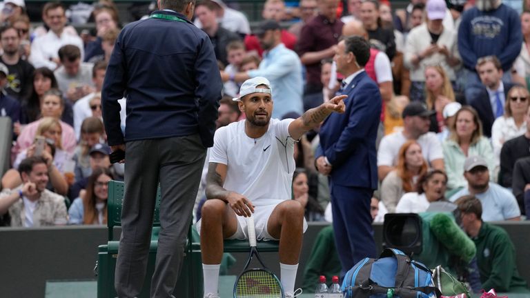 Australia's Nick Kyrgios talks to an official during a third round men's singles match against Greece's Stefanos Tsitsipas on day six of the Wimbledon. Pic: AP