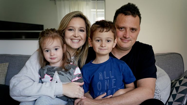 Liam Scott (middle) with his mother Claire, father Mike and sister Kylie at home in Edenbridge, Kent. The five-year-old, who was diagnosed with neuroblastoma cancer in 2019, is cancer free after his family raised �232,000 for him to fly to New York for a cancer-vaccine not currently available in the UK. Picture date: Sunday October 24th, 2021.
