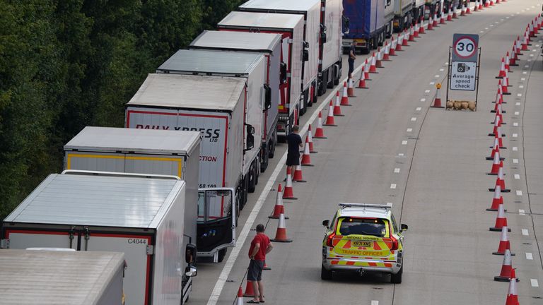 Lorries queue on the M20 near Ashford in Kent as part of Operation Brock