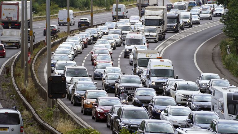 Vehicles queue on the M5 near Portbury, Bristol, as families embark on getaways at the start of summer holidays for many schools in England and Wales. Picture date: Friday July 22, 2022.