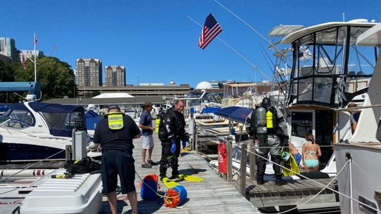 Divers rescued a woman&#39;s huge diamond ring from a river in Massachusets. Pic: Cambridge MA Fire Department