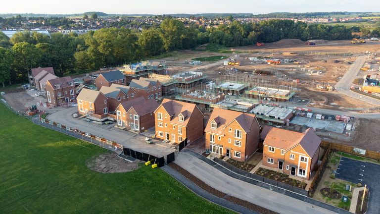 Aerial view looking down on new build housing construction site in England, UK

