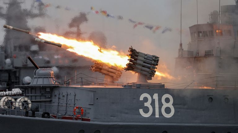 The Russian corvette Aleksin fires missiles during a parade marking Navy Day in Baltiysk in the Kaliningrad region