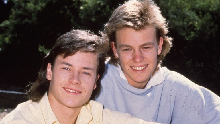 Guy Pearce as Mike Young and Jason Donovan as Scott Robinson in Neighbours. Pic: Fremantle/Shutterstock

2000s