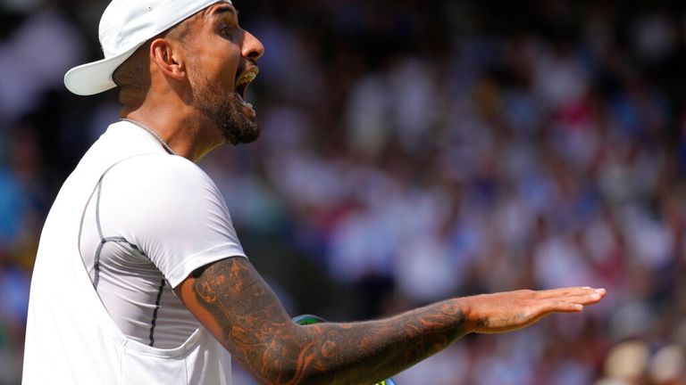 Australia's Nick Kyrgios shouts towards his box during the final of the men's singles against Serbia's Novak Djokovic on day fourteen of the Wimbledon tennis championships in London, Sunday, July 10, 2022. (AP Photo/Kirsty Wigglesworth)