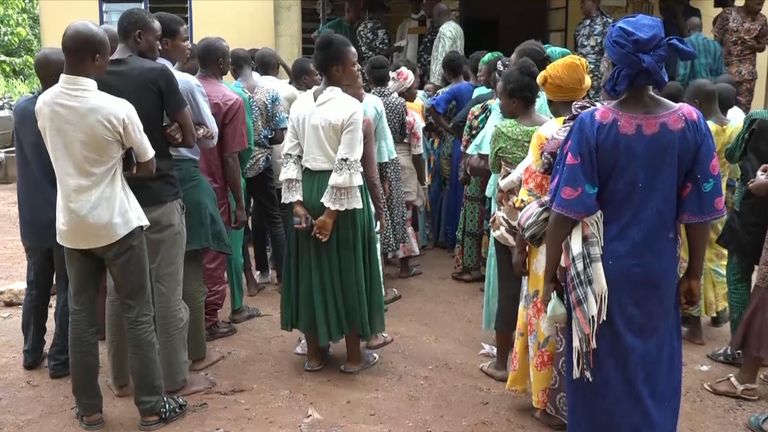 Nigerians await to see family held at church