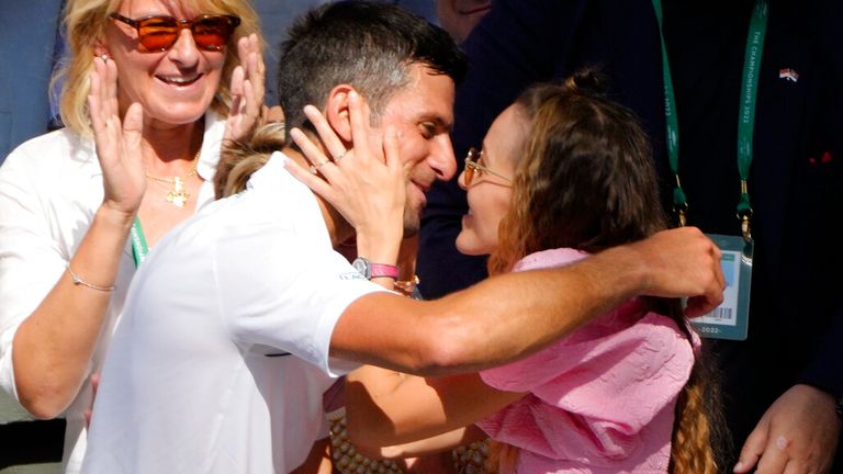 Serbia's Novak Djokovic celebrates with his wife Jelena after beating Australia's Nick Kyrgios in the final of the men's singles against on day fourteen of the Wimbledon tennis championships in London, Sunday, July 10, 2022 (AP Photo/Kirsty Wigglesworth)