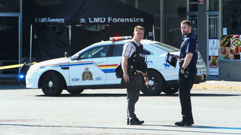 Police officers at the scene in Langley, British Columbia