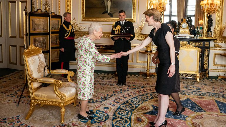 Queen Elizabeth II, accompanied by the Prince of Wales, presenting the George Cross to Ms Amanda Pritchard, Chief Executive of NHS England, and Ms May Parsons, Modern Matron at University Hospital Coventry and Warkwickshire, as representatives of the National Health Service during an Audience at Windsor Castle, Berkshire. Picture date: Tuesday July 12, 2022.