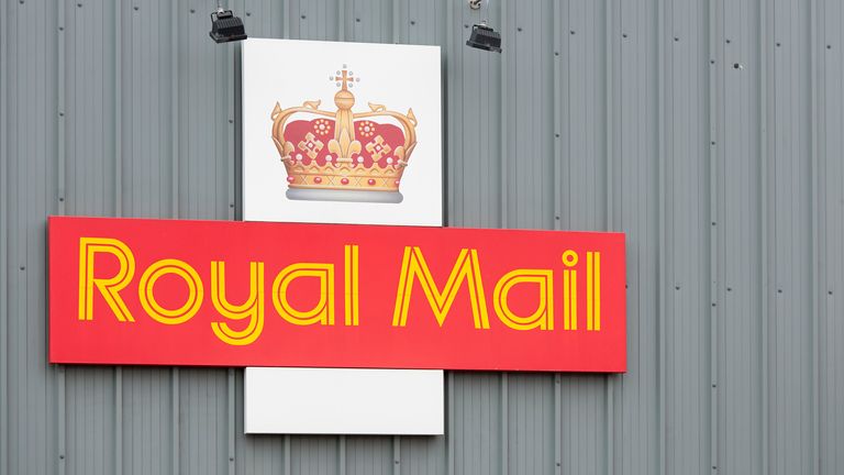 Edinburgh, Scotland, UK - 27th May 2011: The Royal Mail logo on an exterior wall of a public delivery office.  Royal Mail is the national postal company for the UK...A large Royal Mail logo on the outside of delivery office building.