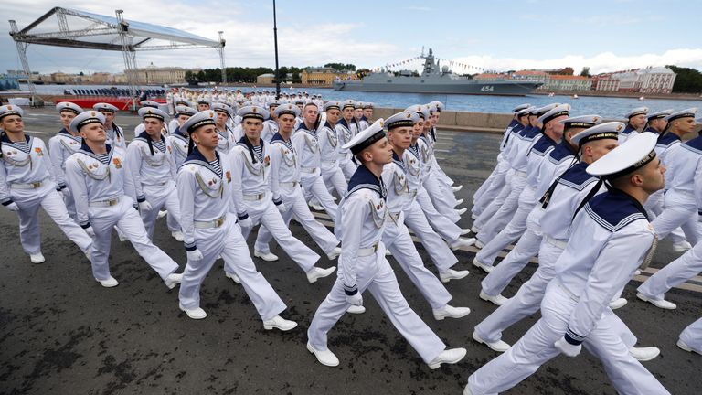Russian sailors march during a parade
