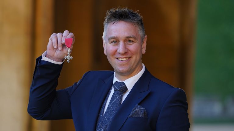 Ryan Jones from Mumbles after he was made an MBE for services to rugby union football and charitable fundraising in Wales by the Princess Royal at Windsor Castle during an Investiture ceremony