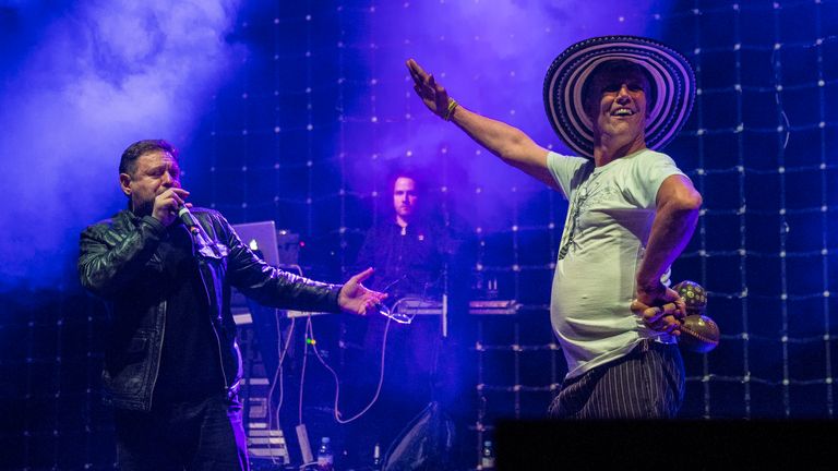 Shaun Ryder, left, and Bez, of British band Happy Mondays, perform on stage at the Brixton Academy in south London, Thursday, Dec. 3, 2015. Happy Mondays are on tour to celebrate the 25th anniversary of their album Pills 'n' Thrills and Bellyaches, (Photo by Joel Ryan/Invision/AP)