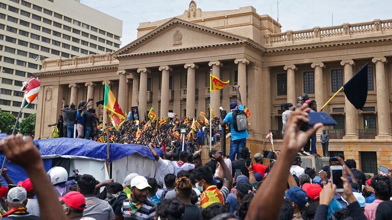 Crowds assembled outside the president&#39;s office in Colombo. Pic: AP 