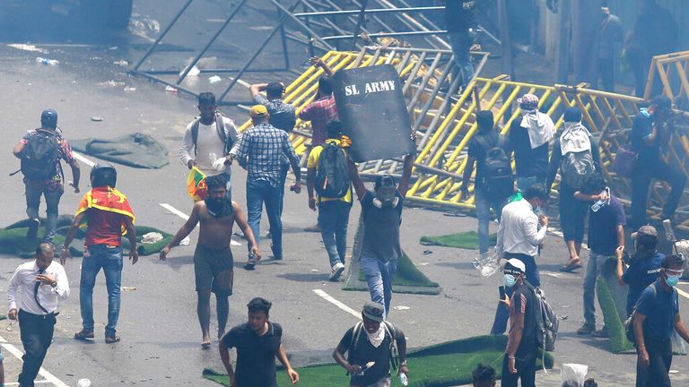 Sri Lankan authorities attempt to disperse protesters in Colombo on Saturday, July 9 Pic: AP 