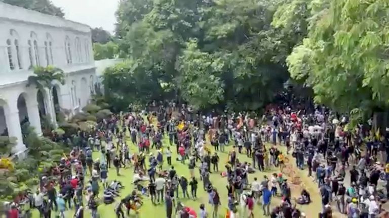 Protestors pictured in the garden of the president&#39;s home in Colombo. Pic: Reuters 