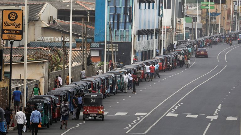Crisis-hit Sri Lanka shuts schools, urges work from home to save fuel
Three-wheelers queue to buy petrol due to fuel shortage, amid the country&#39;s economic crisis, in Colombo, Sri Lanka, July 5 2022. REUTERS/Dinuka Liyanawatte