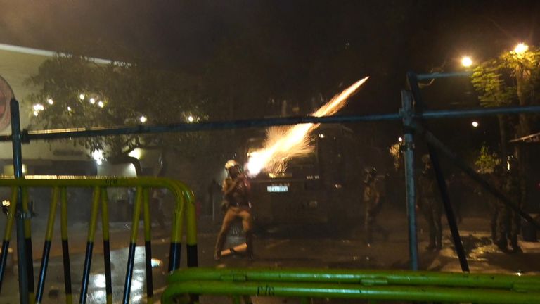 Tear gas was fired at a crowd of protesters in Colombo
