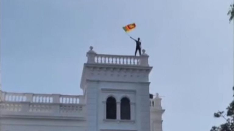 Footage shows protesters inside the complex, waving the Sri Lankan national flag on the roof and chanting.
