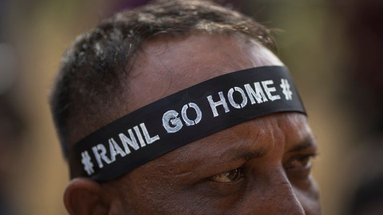 A protestor wears a band as he attends a protest against Sri Lanka&#39;s newly elected President Ranil Wickremesinghe, amid the country&#39;s economic crisis, in Colombo, Sri Lanka July 20, 2022. REUTERS/Adnan Abidi