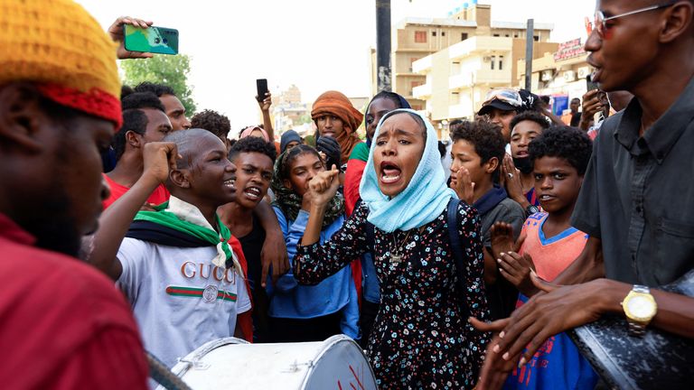 Protesters gather during a rally against military rule in Khartoum North
Protesters shout slogans during a rally against military rule, following the last coup and to commemorate the 3rd anniversary of demonstrations in Khartoum North, Sudan July 1, 2022. REUTERS/Mohamed Nureldin Abdallah