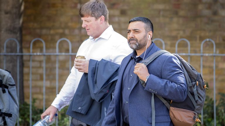 PC Sukhdev Jeer (right) and PC Paul Hefford arriving for a misconduct hearing at Empress State Building, London. It is alleged that former Officer Richard Hammond, PC Paul Hefford and PC Sukhdev Jeer were part of a WhatsApp messaging group which was used to exchange messages, memes and other content which was inappropriate, highly offensive and discriminatory. Picture date: Friday July 1, 2022.
