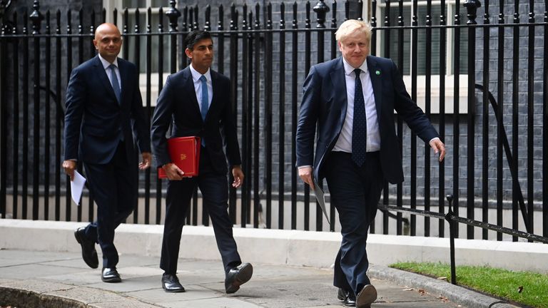 Britain&#39;s Prime Minister Boris Johnson, Britain&#39;s Chancellor of the Exchequer Rishi Sunak, and Britain&#39;s Health Secretary Sajid Javid arrive for a news conference in Downing Street, in London, Britain, September 7, 2021. REUTERS/Toby Melville/Pool